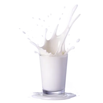 a glass filled with milk on a white background