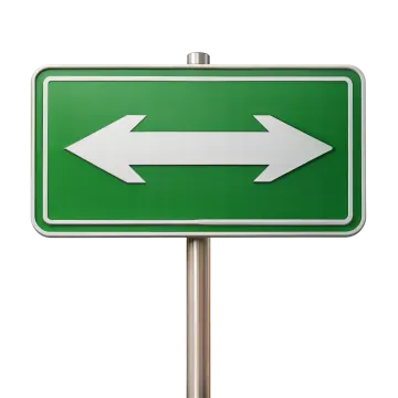 a green road sign with an arrow pointing to the right