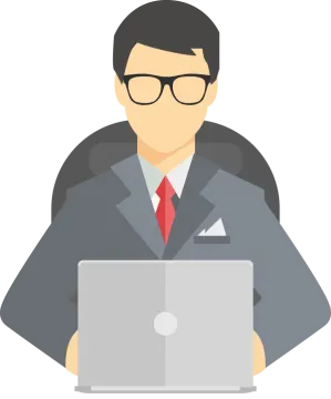 a man in a suit and glasses working on a laptop
