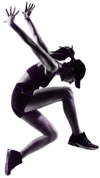 a woman jumping in the air on a white background