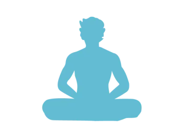 a silhouette of a person sitting in a yoga pose
