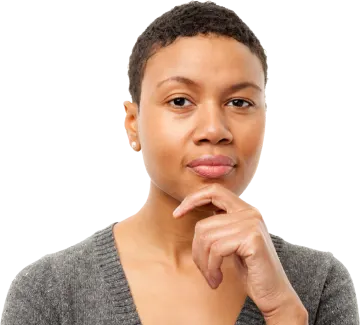 a woman with a finger on her lips