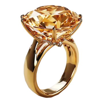 a gold ring with an orange topazte