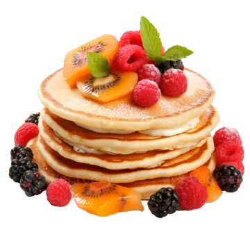 a stack of pancakes topped with fruit and syrup