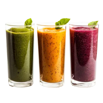 three glasses filled with different colored smoothies