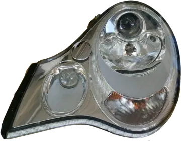 a pair of headlights with chrome housings