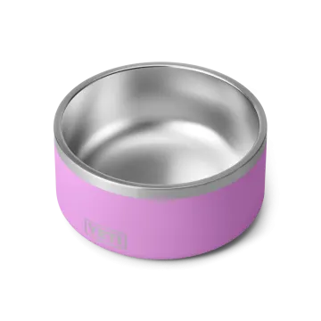 a pink dog bowl on a white background