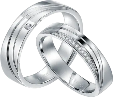 a pair of white gold wedding rings with diamonds