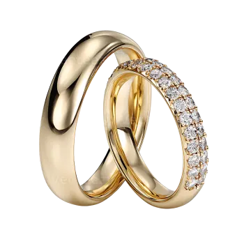 a pair of gold wedding rings with diamonds