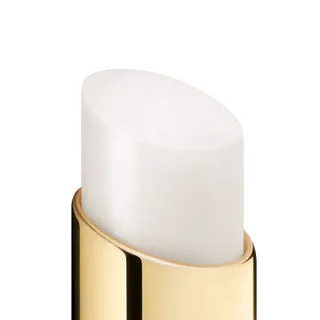 a gold and white lip with a white top