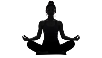 a silhouette of a woman doing yoga