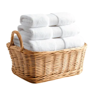 a basket filled with white towels