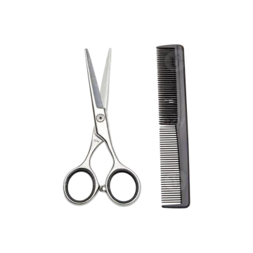 a pair of scissors and comb on a white background