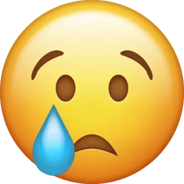 a yellow smiley face with a tear on it