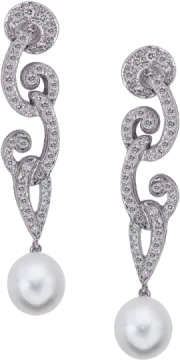 a pair of pearl and diamond earrings