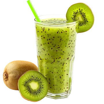 a glass filled with green smoothie next to a kil