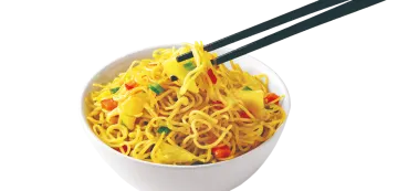 a bowl of noodles with chops in it