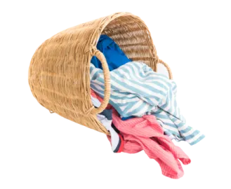 a basket full of clothes on a white background