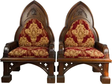 a pair of chairs with red and gold uphols