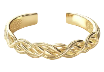 a gold bracelet with an intricate braid design