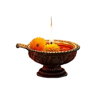 a small oil lamp with flowers in it