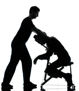 a silhouette of a man pushing a woman in a chair