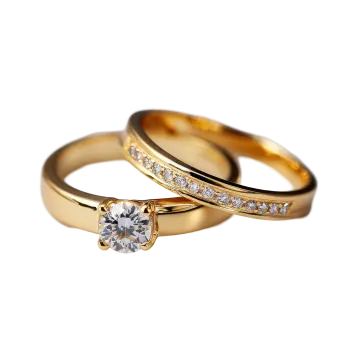 a pair of gold wedding rings with diamonds