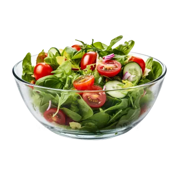 a glass bowl filled with fresh vegetables