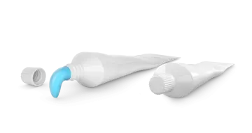 two white plastic bottles with blue caps