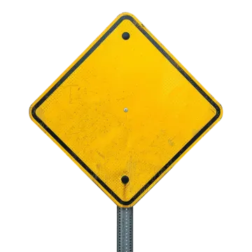 a yellow street sign on a metal pole