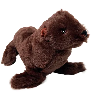 a stuffed animal sitting on top of a white surface