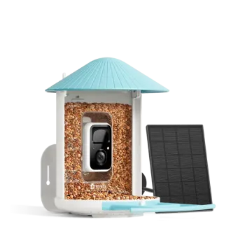 a bird feeder with solar panels and a blue roof