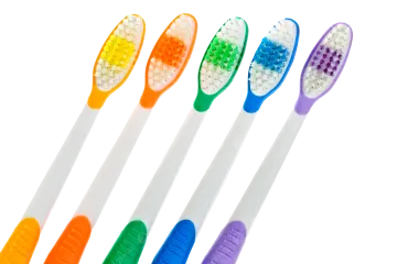four toothbrushs with different colors on them