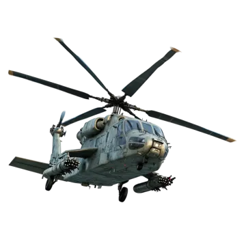 a military helicopter flying in the sky