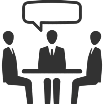 a group of people sitting at a table with speech bubbles above them