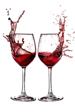 two wine glasses with red wine splashing out