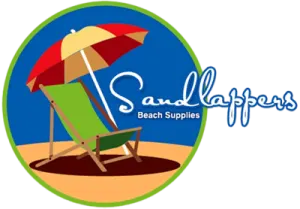 a beach chair with an umbrella in the sand