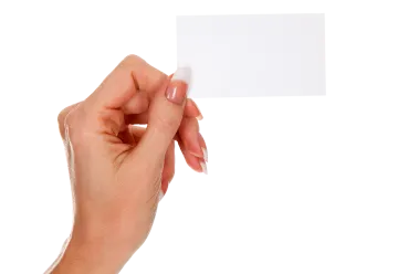 a person holding a business card in their hand