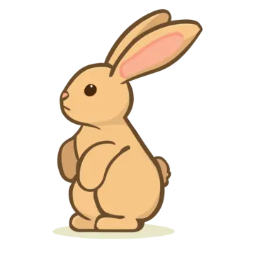 a brown rabbit sitting on its hind