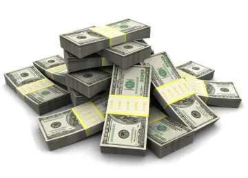 a pile of money on a white background