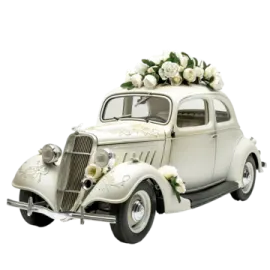 a white wedding car with flowers on top