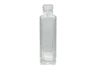 a clear glass bottle with a white cap