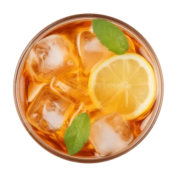 a glass filled with ice, lemon and mint