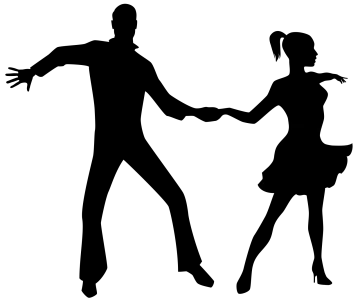 a silhouette of a couple dancing