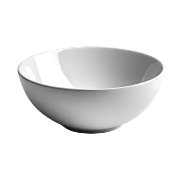 a white bowl sitting on top of a table