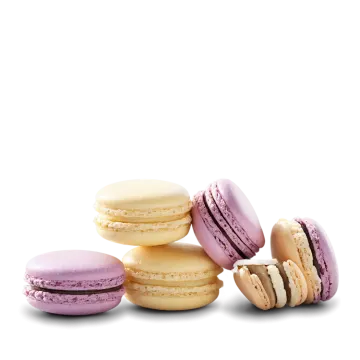 a pile of macaroes on a white background