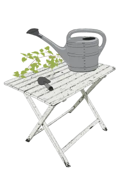 a garden table with a watering pot on top of it