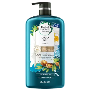 a bottle of bath oil with flowers on it