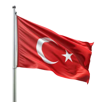a red and white flag flying in the wind