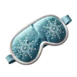 a blue eye mask with snowfls on it